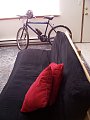 My bike via the futon. 